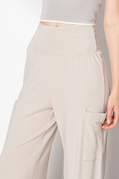 WIDE BANDED JERSEY KNIT FLARE PANTS WITH POCKETS