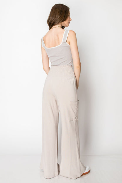 WIDE BANDED JERSEY KNIT FLARE PANTS WITH POCKETS