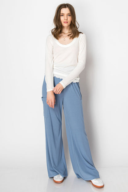 WIDE BANDED JERSEY KNIT FLARE PANTS WITH POCKETS